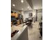 Bright kitchen area with tile floors, stainless steel appliances, and a dining area at 4915 Pond Ridge Dr, Riverview, FL 33578