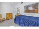 Inviting bedroom with a view into the kitchen at 5840 30Th S Ave # 208, Gulfport, FL 33707