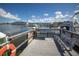 A pleasant view of the docks with boats, buildings, and a bench for enjoying the scenery at 5840 30Th S Ave # 208, Gulfport, FL 33707