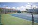 Community tennis courts offering recreational opportunities with a tennis net at 5840 30Th S Ave # 208, Gulfport, FL 33707