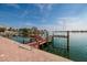 Scenic view of a private boat dock and waterfront, perfect for boating enthusiasts at 7013 Boca Ciega Dr, St Pete Beach, FL 33706