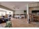 Spacious living room under renovation with tile floors and exposed framing, offering potential for a custom design at 7013 Boca Ciega Dr, St Pete Beach, FL 33706