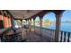 Large patio area overlooking waterfront at 7013 Boca Ciega Dr, St Pete Beach, FL 33706