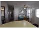 Inviting dining area with seating for four and charming coastal decor at 7129 El Rancho Way, Zephyrhills, FL 33541