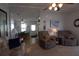Open living space with a dining area, and kitchen, perfect for entertaining guests at 7129 El Rancho Way, Zephyrhills, FL 33541