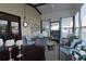 Relaxing sunroom with comfortable seating perfect for enjoying outdoor views and natural light at 7129 El Rancho Way, Zephyrhills, FL 33541