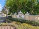 Community entrance sign among landscaped greenery, showcasing 'Eagle Palms' in the foreground at 8835 Moonlit Meadows Loop, Riverview, FL 33578