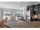 Modern kitchen with stainless steel appliances, granite countertops and a sink with a view to the outside at 8835 Moonlit Meadows Loop, Riverview, FL 33578