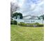 Welcoming entrance to West Bay, a deed restricted community at 10251 Oasis Palm Dr, Tampa, FL 33615