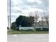 West Bay entrance sign surrounded by lush landscaping at 10251 Oasis Palm Dr, Tampa, FL 33615