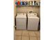 Bright laundry room featuring a side-by-side washer and dryer at 10251 Oasis Palm Dr, Tampa, FL 33615