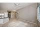 Spacious living room featuring tile flooring, neutral walls, and natural light at 10251 Oasis Palm Dr, Tampa, FL 33615