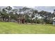 A spacious park with a playground and a pavilion offers a recreational green space for the community to enjoy at 10251 Oasis Palm Dr, Tampa, FL 33615