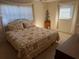 Bright bedroom featuring a comfortable bed, window, and soft natural light at 11470 88Th Ter, Seminole, FL 33772