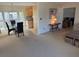 Open floorplan, with a view of dining area, kitchen, carpet, and natural lighting at 11470 88Th Ter, Seminole, FL 33772