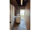 Utility area with washer, dryer, exposed ducts, and access to the outdoors at 11470 88Th Ter, Seminole, FL 33772