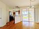 Dining Area with stainless steel appliances and view of the scenic pond at 12287 Country White Cir, Tampa, FL 33635