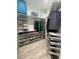 Well-organized walk-in closet with shelving and drawers for optimal storage at 15426 Mccomb Cir, Port Charlotte, FL 33981