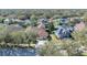 Aerial view of a residential neighborhood showcasing well-maintained homes and lush landscaping at 15720 Ibisridge Dr, Lithia, FL 33547