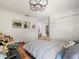 Cozy bedroom with hardwood floors, closet and soft lighting at 15720 Ibisridge Dr, Lithia, FL 33547