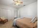 Welcoming bedroom showcasing neutral walls, carpet, and natural light from the window at 15720 Ibisridge Dr, Lithia, FL 33547