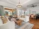 Bright and airy living room that opens to dining area and screened patio at 15720 Ibisridge Dr, Lithia, FL 33547