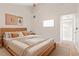 Cozy bedroom with a comfortable bed, stylish decor, and a bright, airy feel for restful nights at 2003 Mcmullen Ave, Dunedin, FL 34698