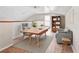 Comfortable home office with a bright window, bookshelf, neutral decor, and a peaceful work environment at 2003 Mcmullen Ave, Dunedin, FL 34698