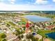Aerial view of a neighborhood and pond at 2604 Dakota Rock Dr, Ruskin, FL 33570