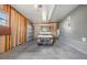 Spacious garage designed to accommodate a golf cart and extra storage space at 36645 Kay Ave, Zephyrhills, FL 33542