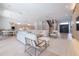 Open living room with modern furnishings, a staircase, and lots of natural light at 4110 W Swann Ave, Tampa, FL 33609