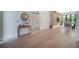 Stylish interior view showcasing a modern mirror and console table in an open living space at 4110 W Swann Ave, Tampa, FL 33609
