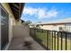 Outdoor balcony with an iron railing and a view of the community at 4215 E Bay Dr # 1601D, Clearwater, FL 33764