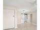 Inviting living space with modern pendant lighting and a glimpse into the adjacent kitchen at 4215 E Bay Dr # 1601D, Clearwater, FL 33764