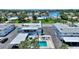 Aerial view of the property with a pool and surrounding neighborhood at 4400 37Th S St # 3, St Petersburg, FL 33711