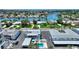Scenic aerial view showcasing the property's pool, boat docks, and waterfront community at 4400 37Th S St # 3, St Petersburg, FL 33711