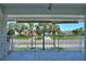 Relaxing balcony with a view of the street and lush trees at 4400 37Th S St # 3, St Petersburg, FL 33711