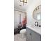 Beautiful bathroom with shiplap walls, modern lighting, and Eiffel Tower themed shower curtain at 4400 37Th S St # 3, St Petersburg, FL 33711