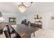 Bright dining room featuring large table, chandelier, and an open floor plan at 4400 37Th S St # 3, St Petersburg, FL 33711