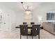 Bright dining room featuring large table, chandelier, and an open floor plan at 4400 37Th S St # 3, St Petersburg, FL 33711