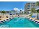 Outdoor pool area with lounge chairs at 4400 37Th S St # 3, St Petersburg, FL 33711