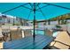 Outdoor pool area with patio seating and umbrella at 4400 37Th S St # 3, St Petersburg, FL 33711
