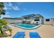 Outdoor pool area with lounge chairs and seating at 4400 37Th S St # 3, St Petersburg, FL 33711