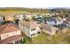 The overhead view showcases the home's backyard, screened in porch, and surrounding landscape at 4739 Tramanto Ln, Wesley Chapel, FL 33543