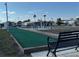 Gather with friends at the bocce ball court featuring seating, creating a fun and social recreational space for residents at 4845 Baker Ave, Zephyrhills, FL 33541
