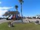 Veteran's memorial including a flag pole, statue, and seating in this community's common area, providing a space for reflection at 4845 Baker Ave, Zephyrhills, FL 33541