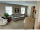 Inviting living room with comfortable seating, natural light, and neutral décor at 4845 Baker Ave, Zephyrhills, FL 33541