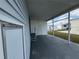 Covered patio with ample space, ideal for storage or outdoor seating in a welcoming community at 4845 Baker Ave, Zephyrhills, FL 33541