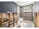 Cozy bathroom featuring a toilet and shower, perfect for relaxation and rejuvenation at 4928 Petunia Ct, New Port Richey, FL 34652