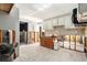 Bright kitchen featuring white cabinets and tile flooring, ready to be customized to your taste at 4928 Petunia Ct, New Port Richey, FL 34652
